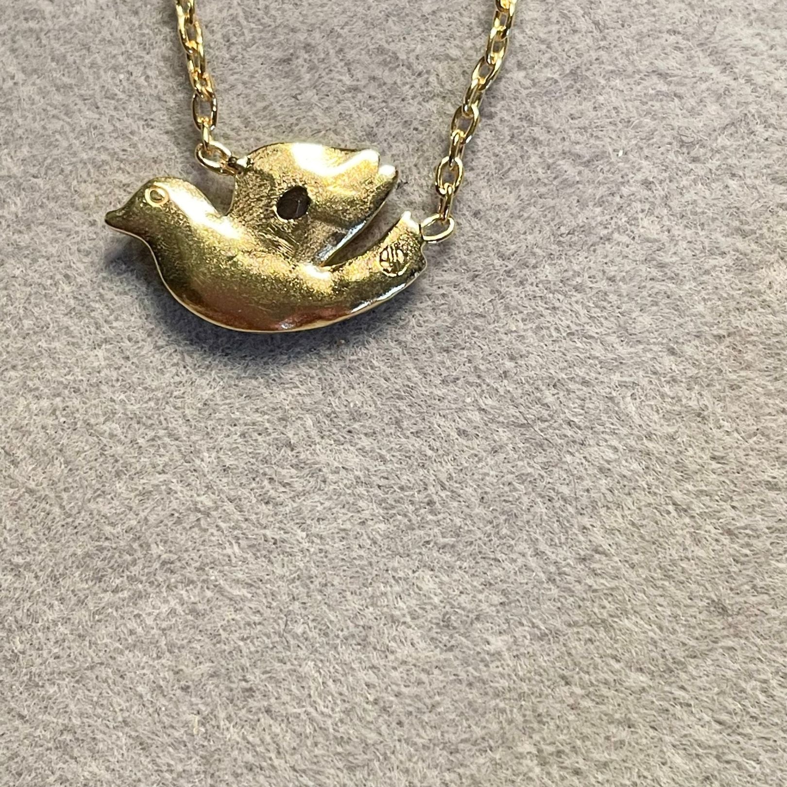 Back of 18k Gold Vermeil with White Topaz Dove necklace by Amy Delson