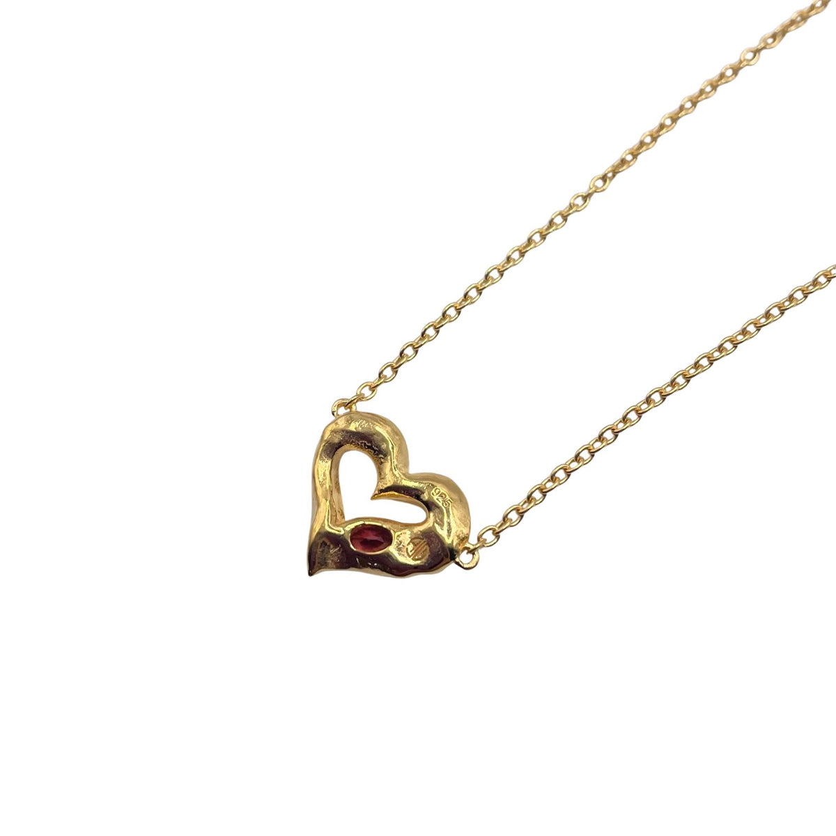 Back of gold garnet heart necklace by Amy Delson