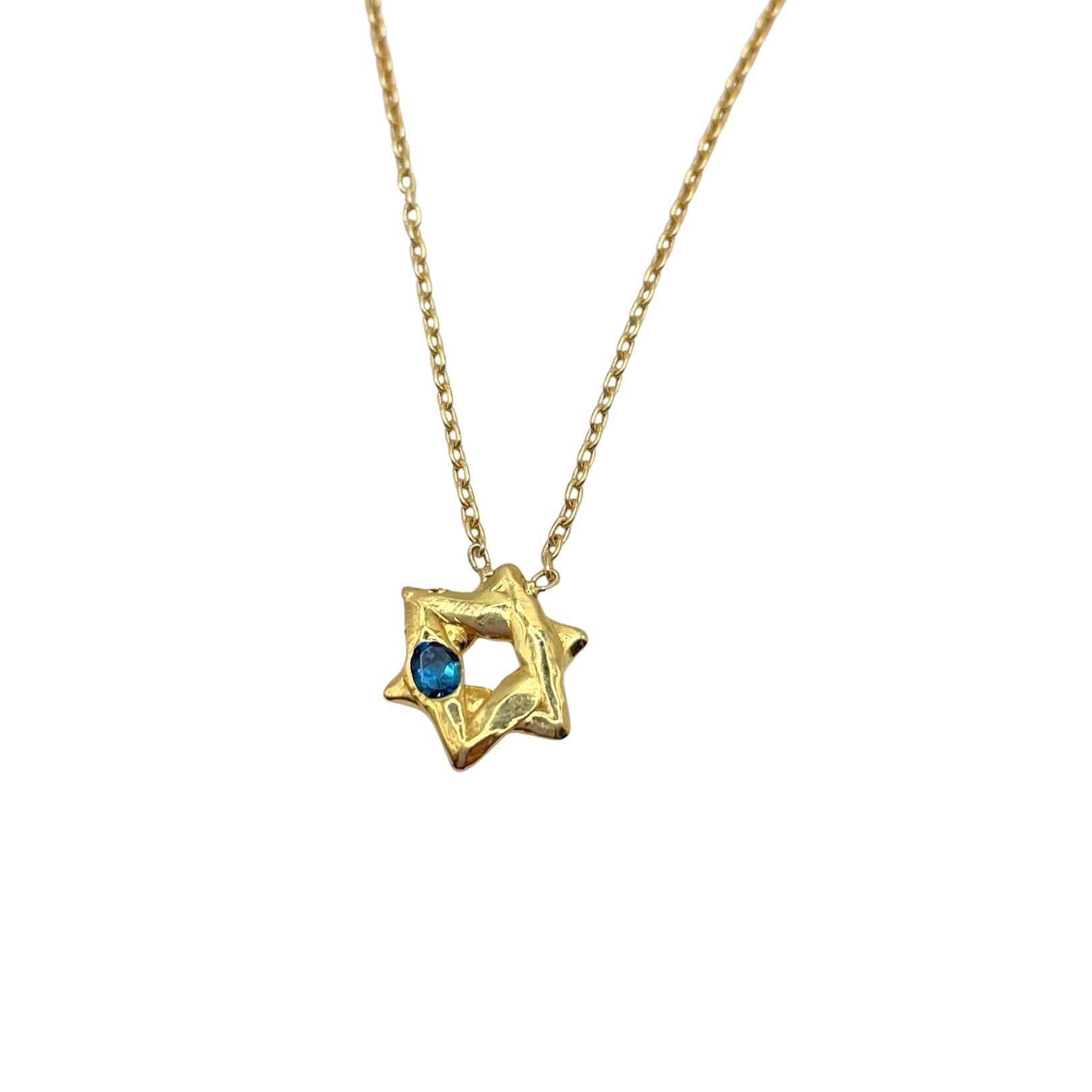 Closeup of 18k Gold vermeil with London Blue Topaz necklace by Amy Delson
