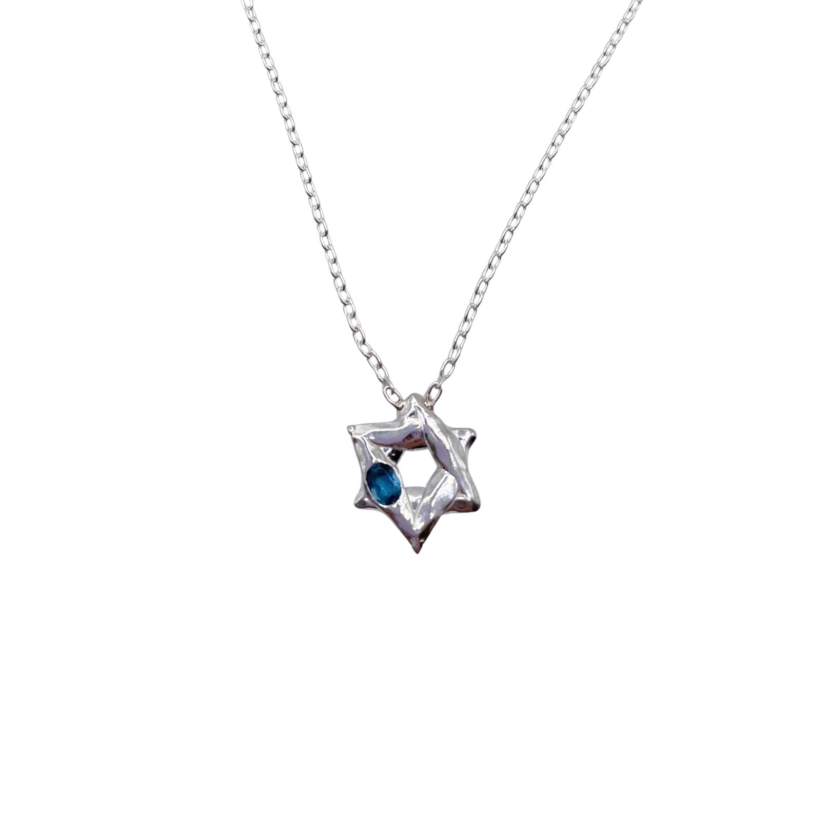 Closeup of Sterling Silver London Blue Topaz Star of David necklace by Amy Delson
