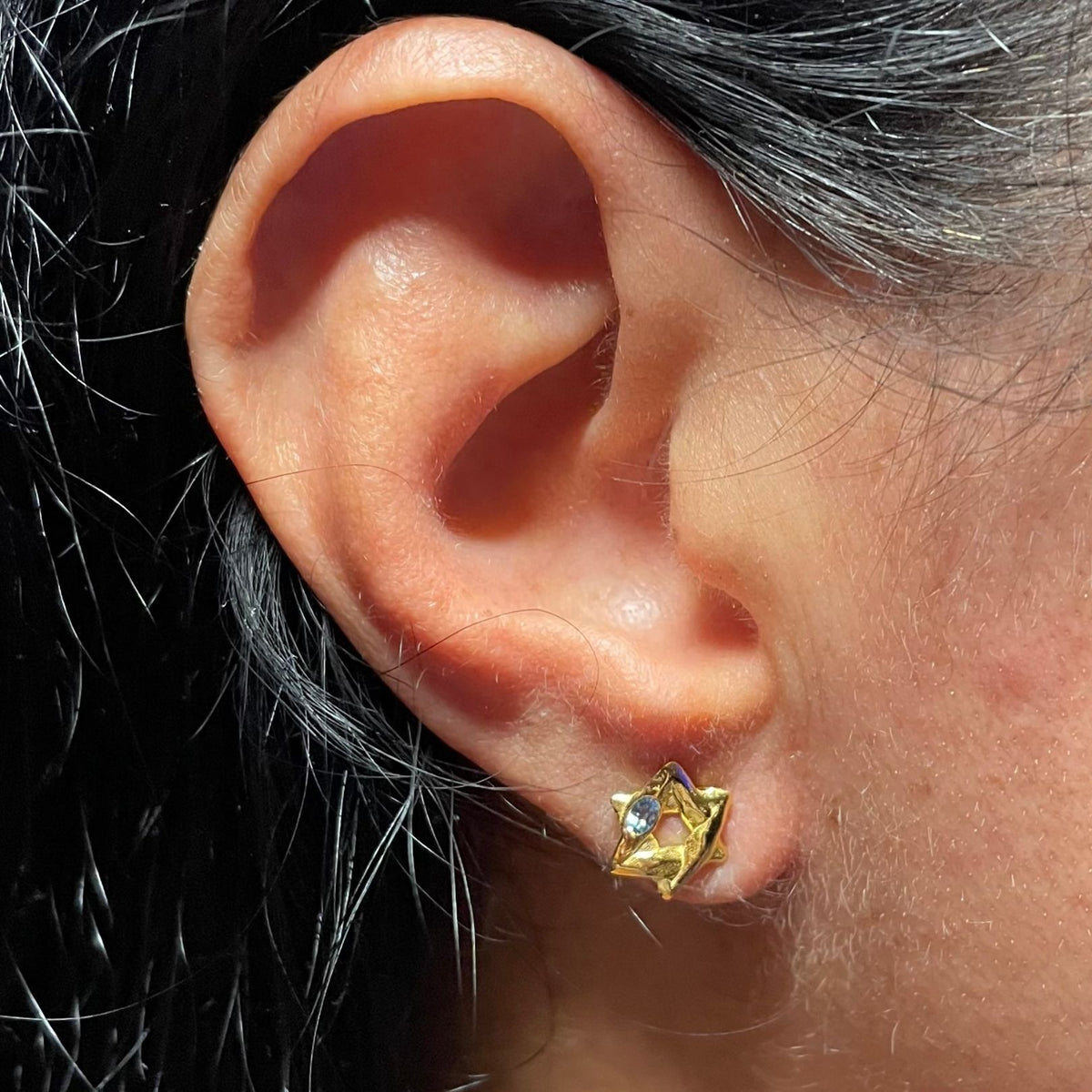 Goldblue topaz Star of David stud by Amy Delson on ear