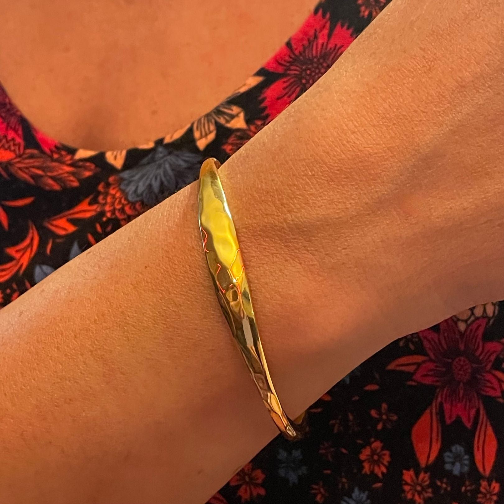Gold forged cuff by Amy Delson on wrist
