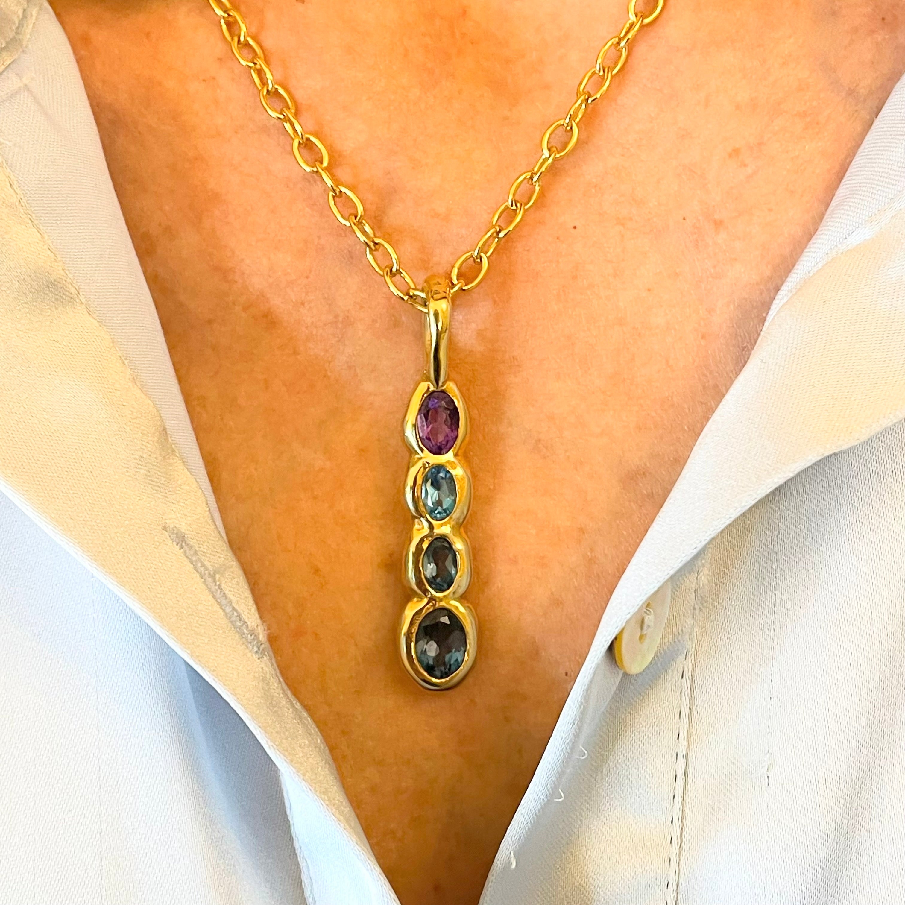 Amy Delson amethyst blue topaz pendant on model