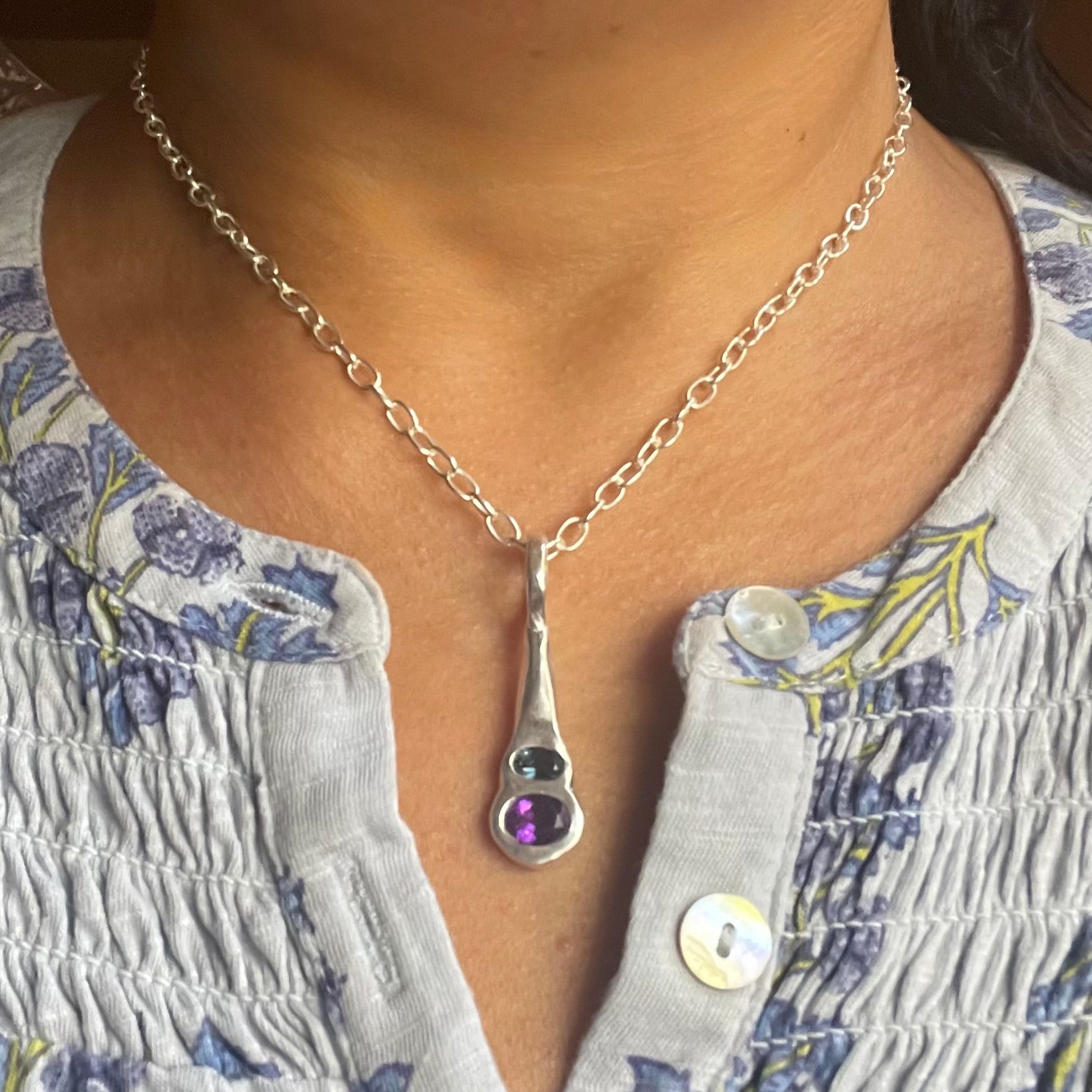 Amy Delson silver London Blue Topaz, Purple Amethyst Necklace shown on the neck.