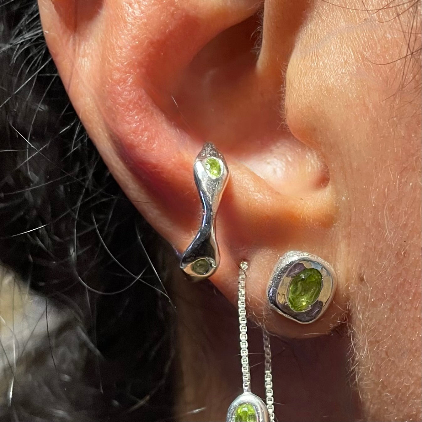 Sterling silver ear cuff with green peridot by Amy Delson