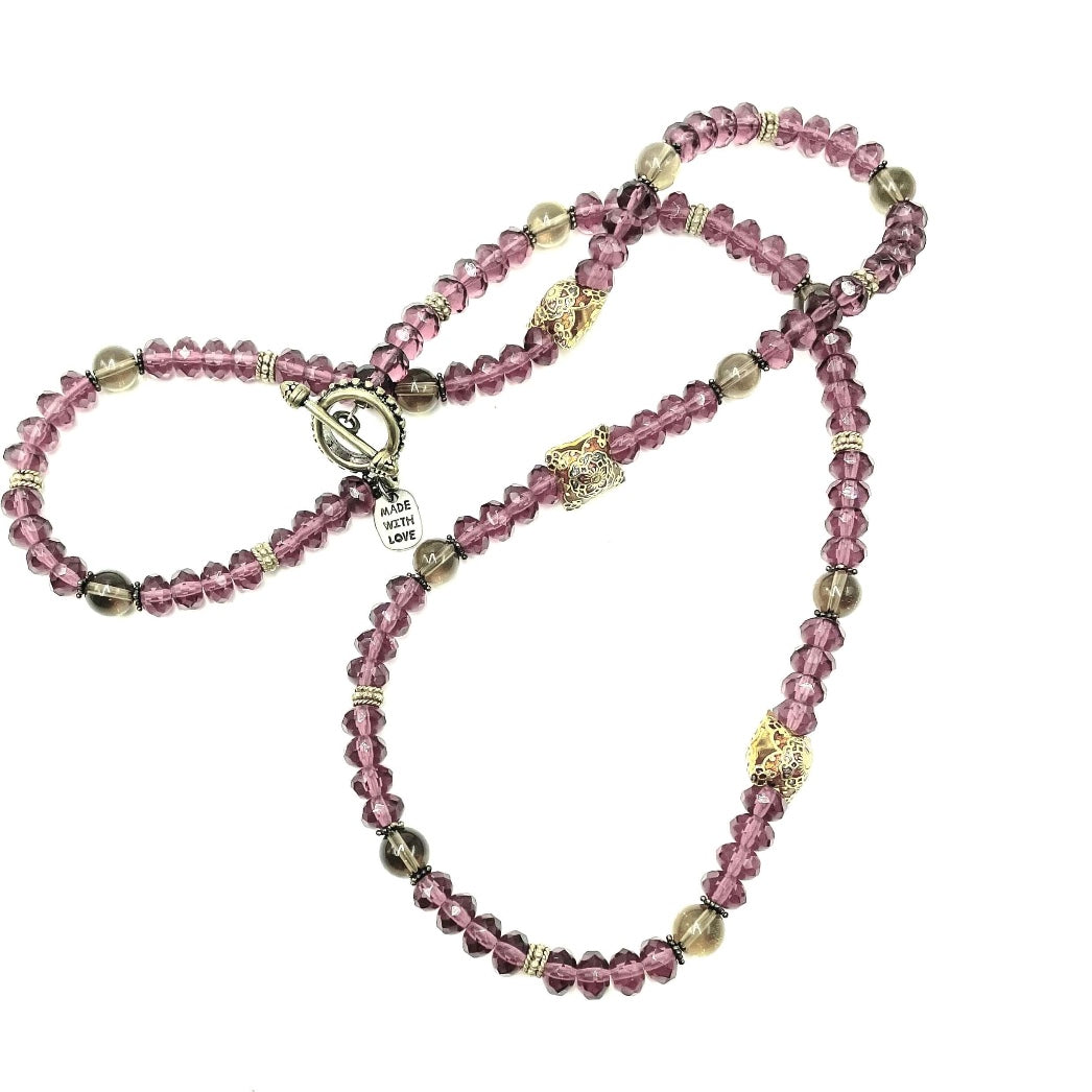 Purple beaded necklace by Amy Delson