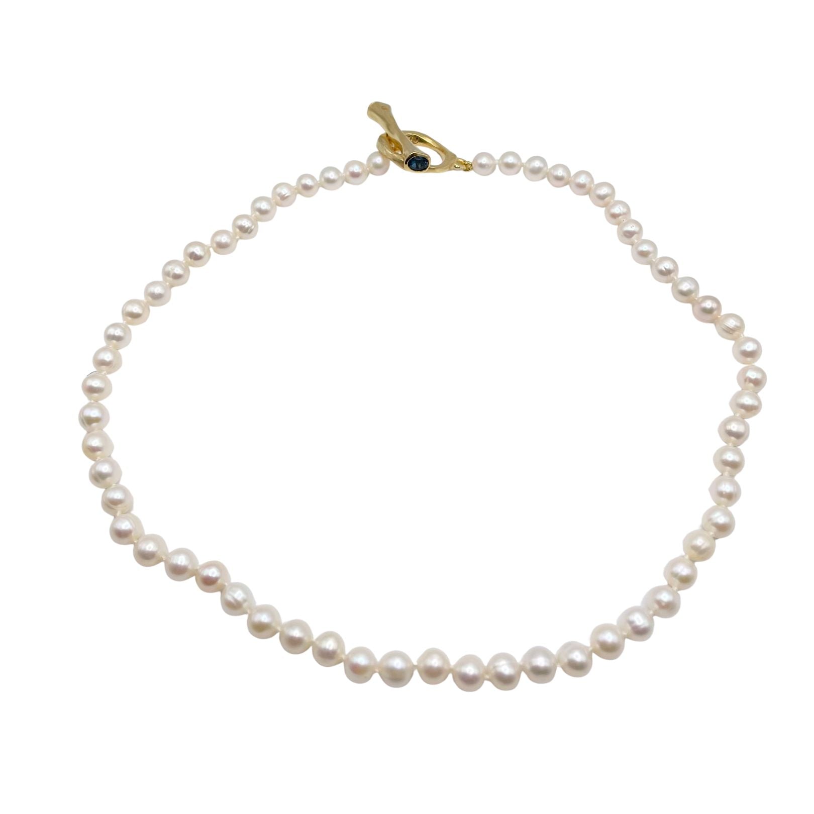 Pearl necklace with gold toggle clasp by Amy Delson