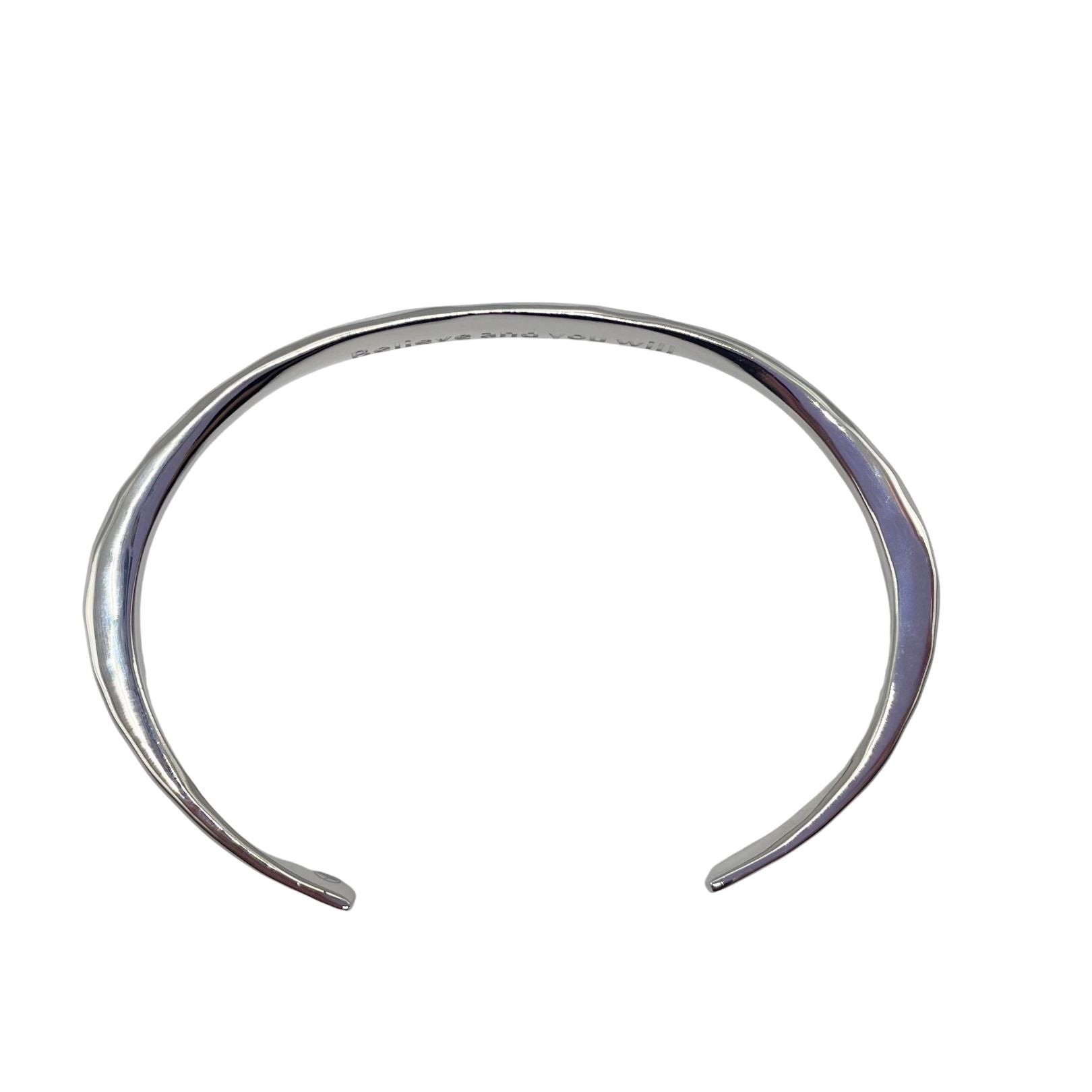 Side view of Silver forged cuff by Amy Delson