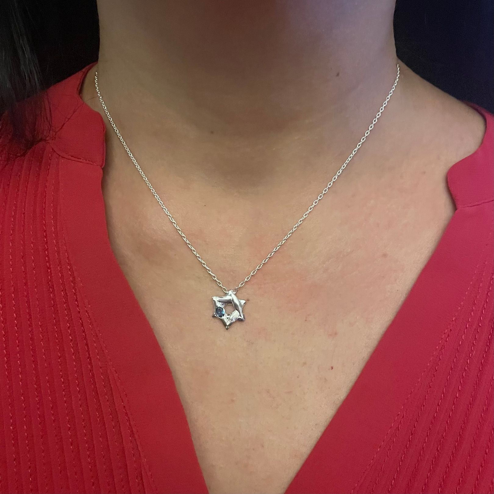 Sterling Silver with London Blue Topaz Star of David Necklace by Amy Delson shown on a model
