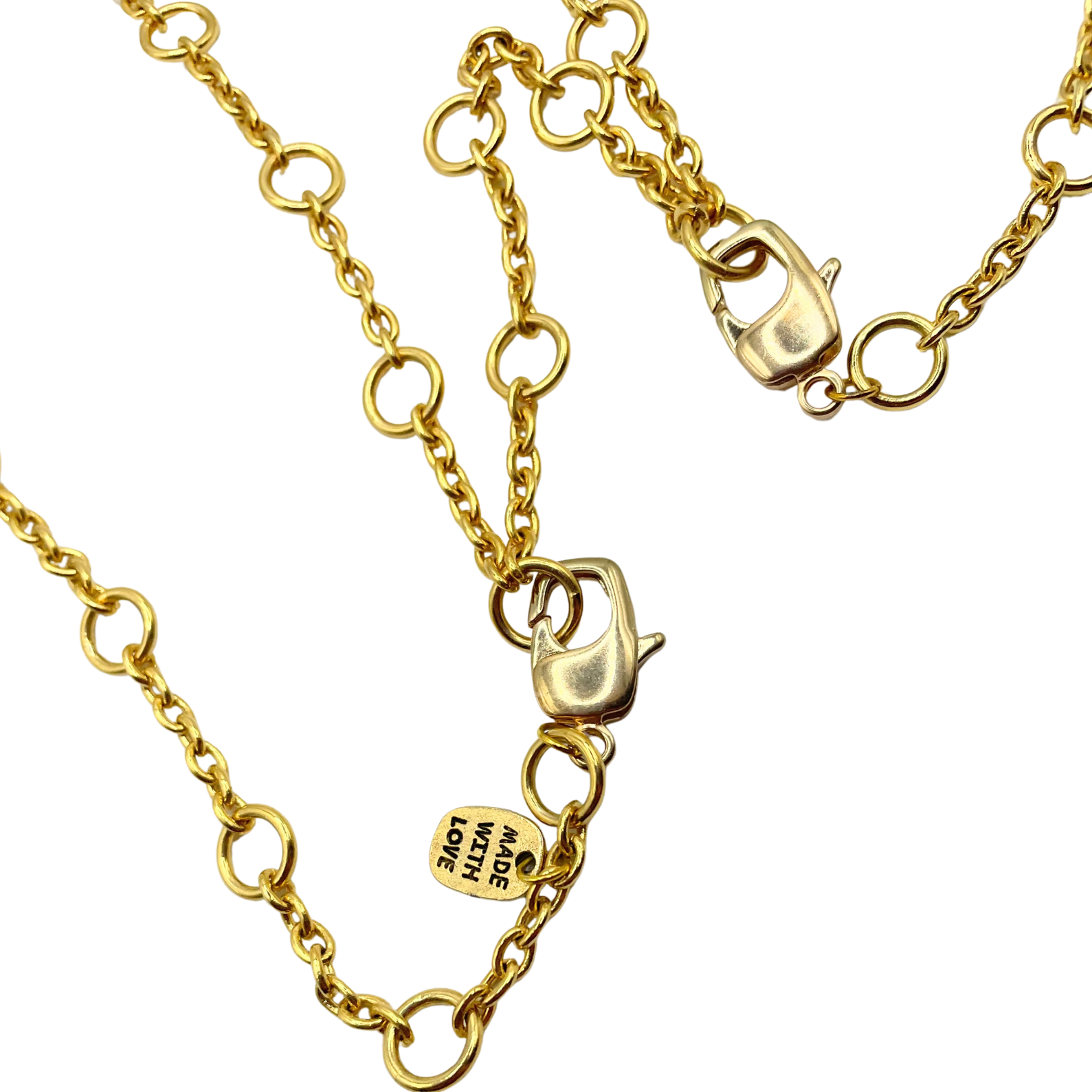 Closeup of clasp and made with love tag Amy Delson body chain