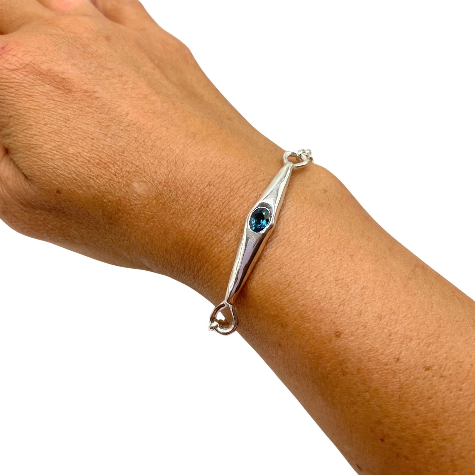 Amy Delson Silver Bracelet with Blue Topaz Gemstone on wrist