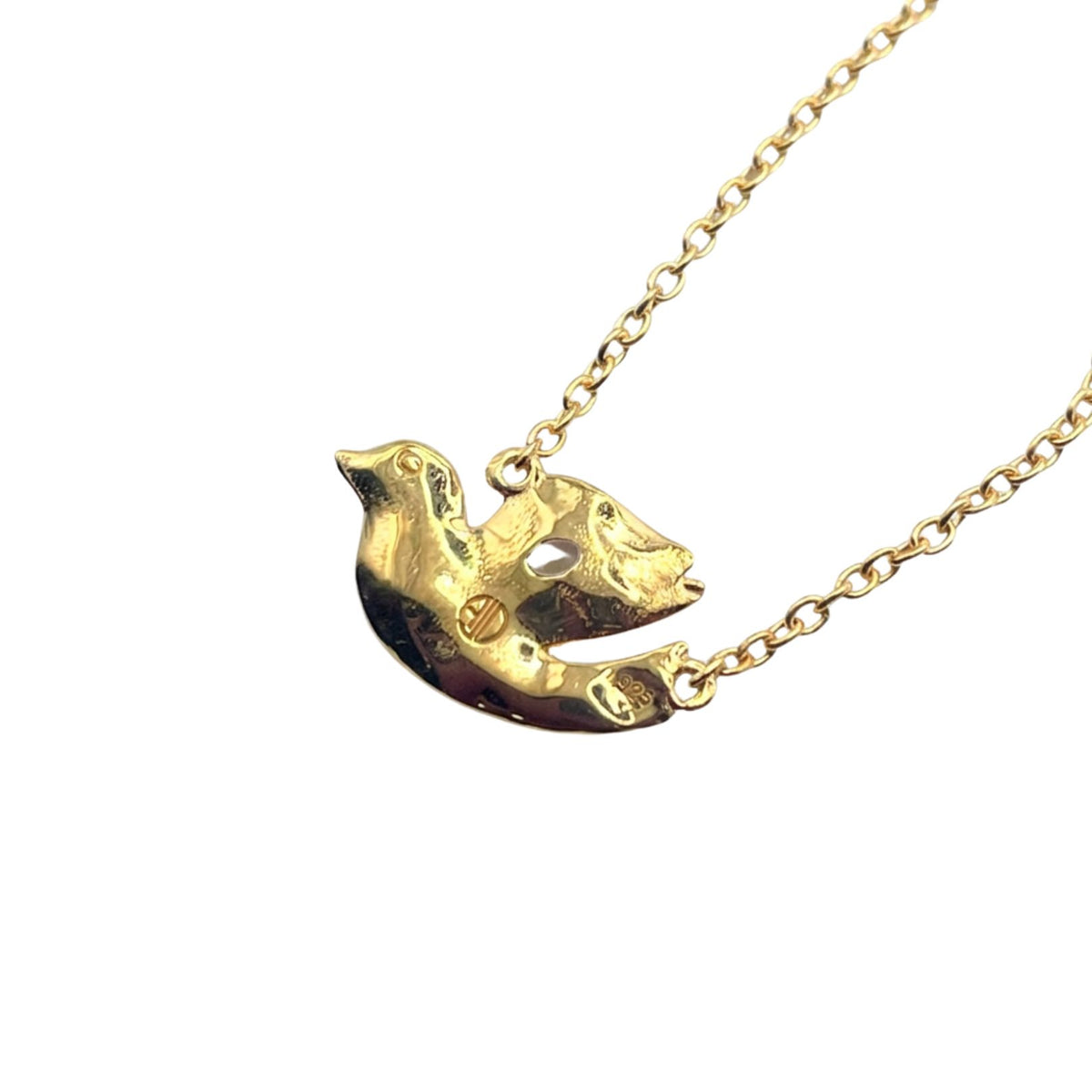 Back of gold dove necklace by Amy Delson