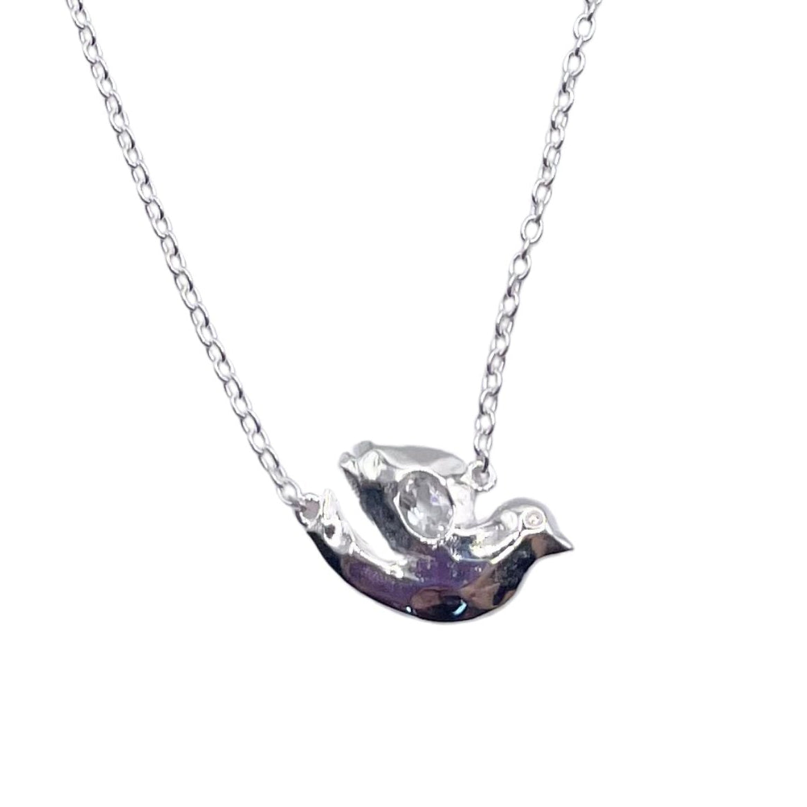 Closeup Silver White Topaz dove necklace Amy Delson