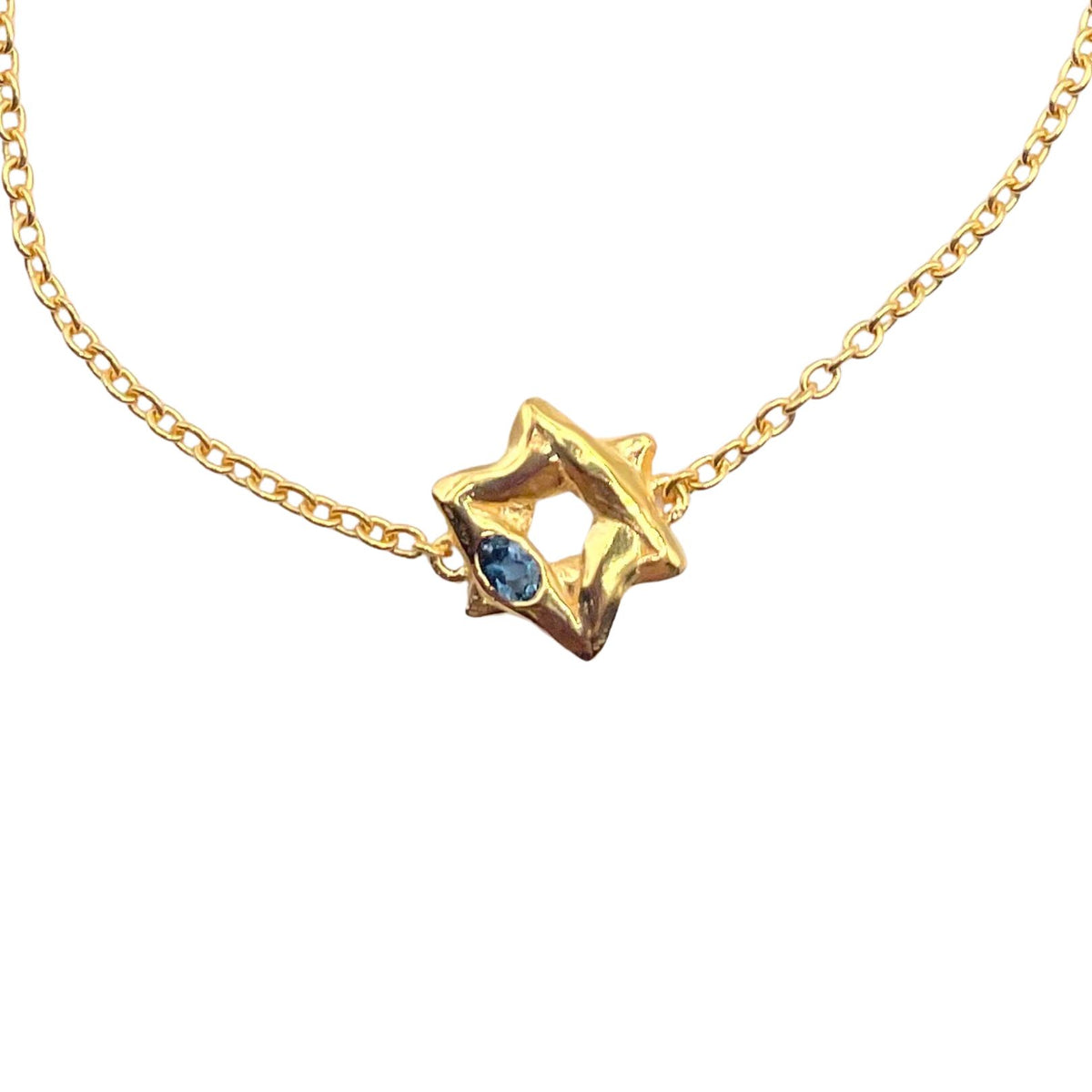 Closeup Gold Blue Topaz Star Bracelet by Amy Delson