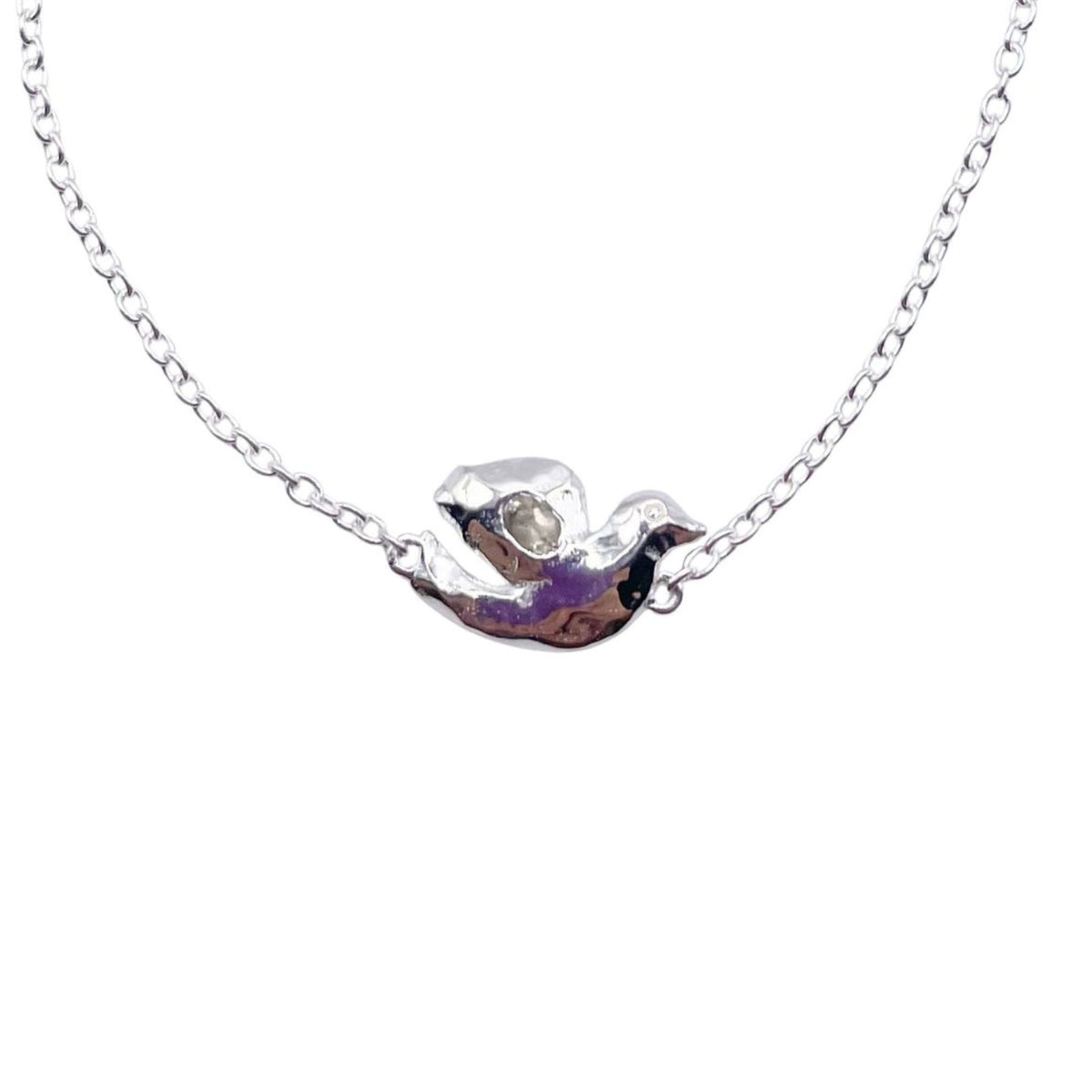 Closeup of Silver White Topaz Dove Bracelet by Amy Delson