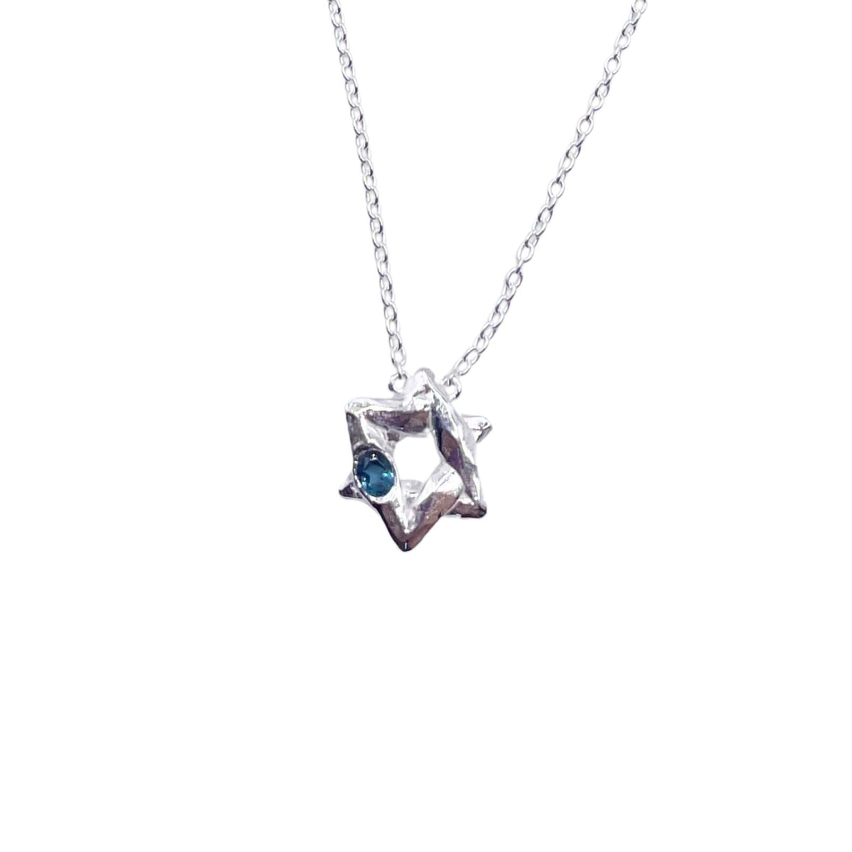 Closeup Silver Star of David blue topaz necklace by Amy Delson