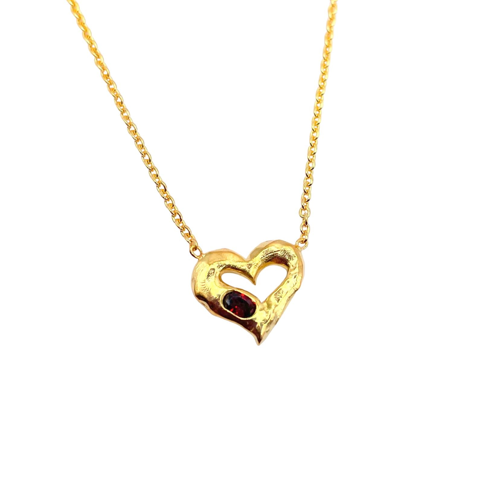 Closeup of 18k Gold Vermeil Red Garnet Heart Necklace by Amy Delson 