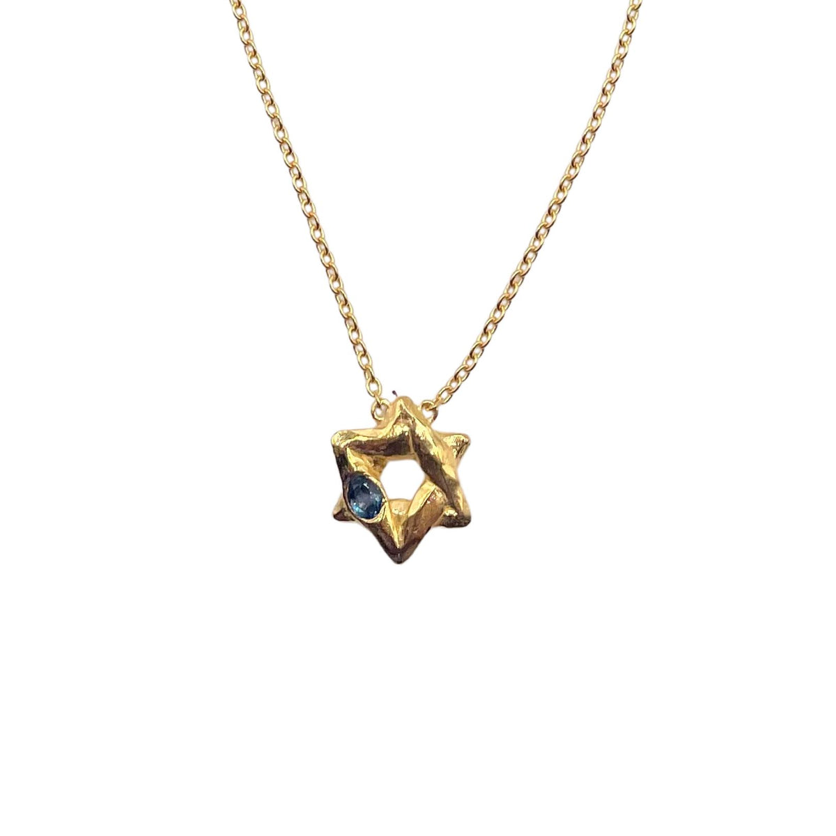 closeup gold blue topaz Star of David necklace by Amy Delson