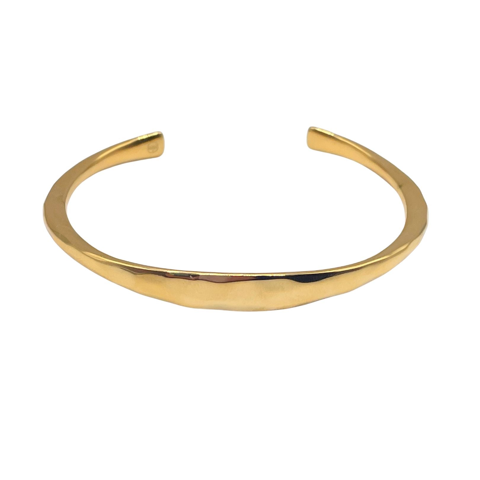Gold forged mantra cuff by Amy Delson