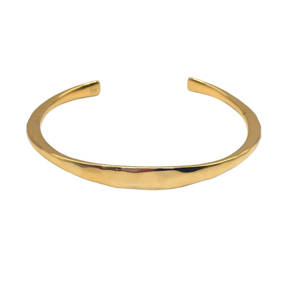 Gold forged mantra cuff by Amy Delson