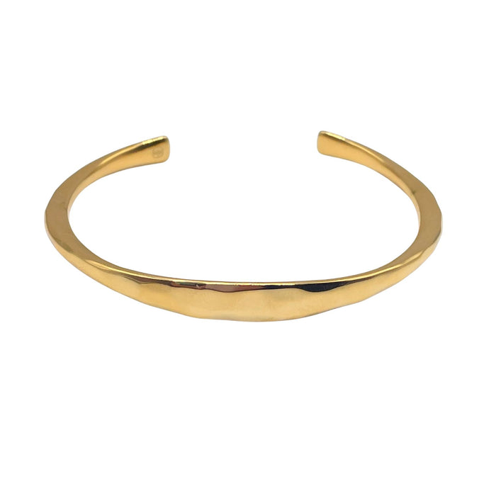 Gold forged mantra cuff by Amy Delson