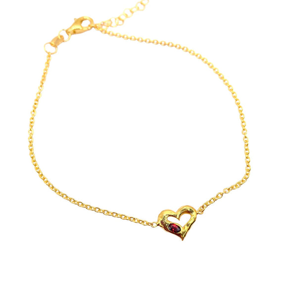 Gold heart with red garnet bracelet by Amy Delson 