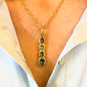 Amy Delson amethyst blue topaz pendant on model