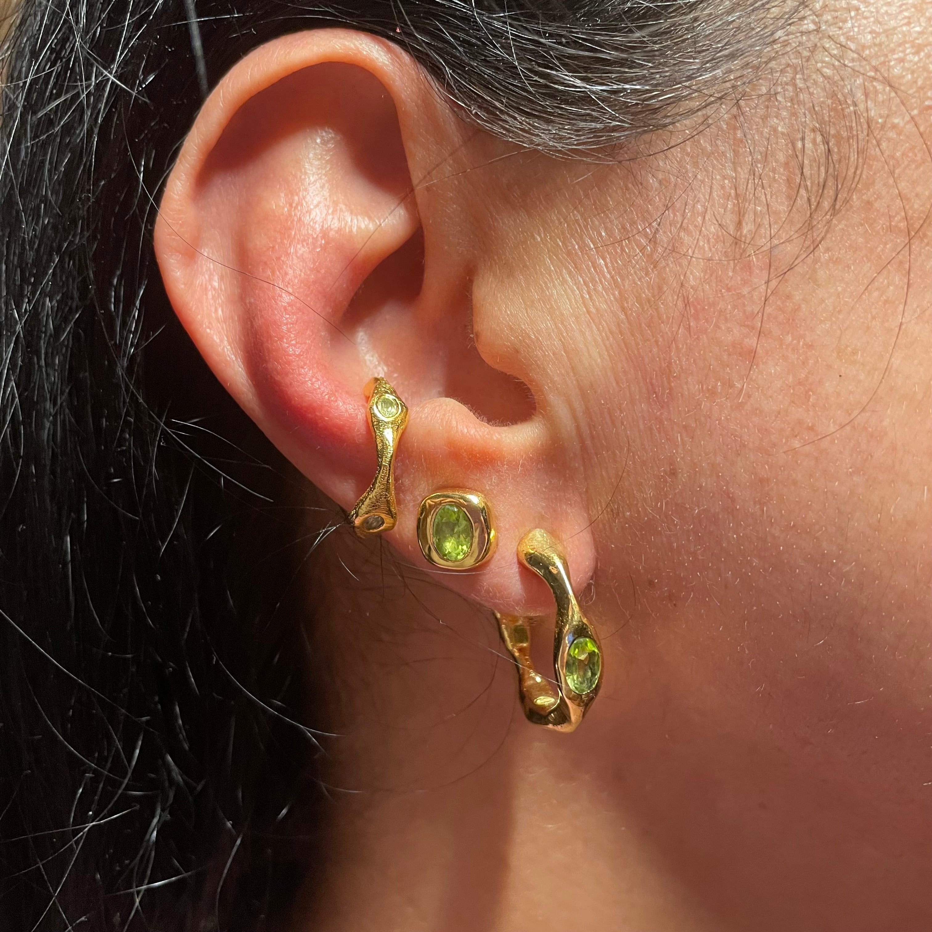 On ear, Green Peridot Gold vermeil hoop earrings, ear cuff and studs by Amy Delson