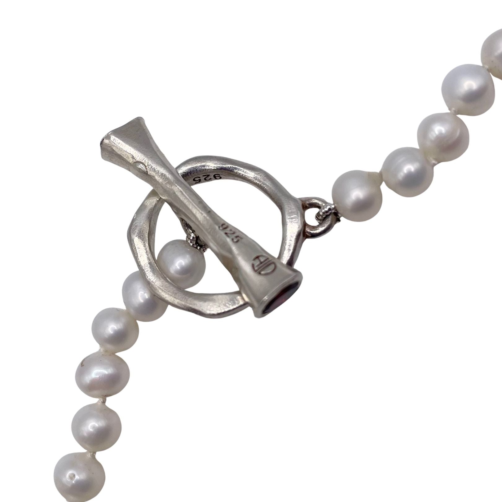Pearl necklace with a silver clasp by Amy Delson
