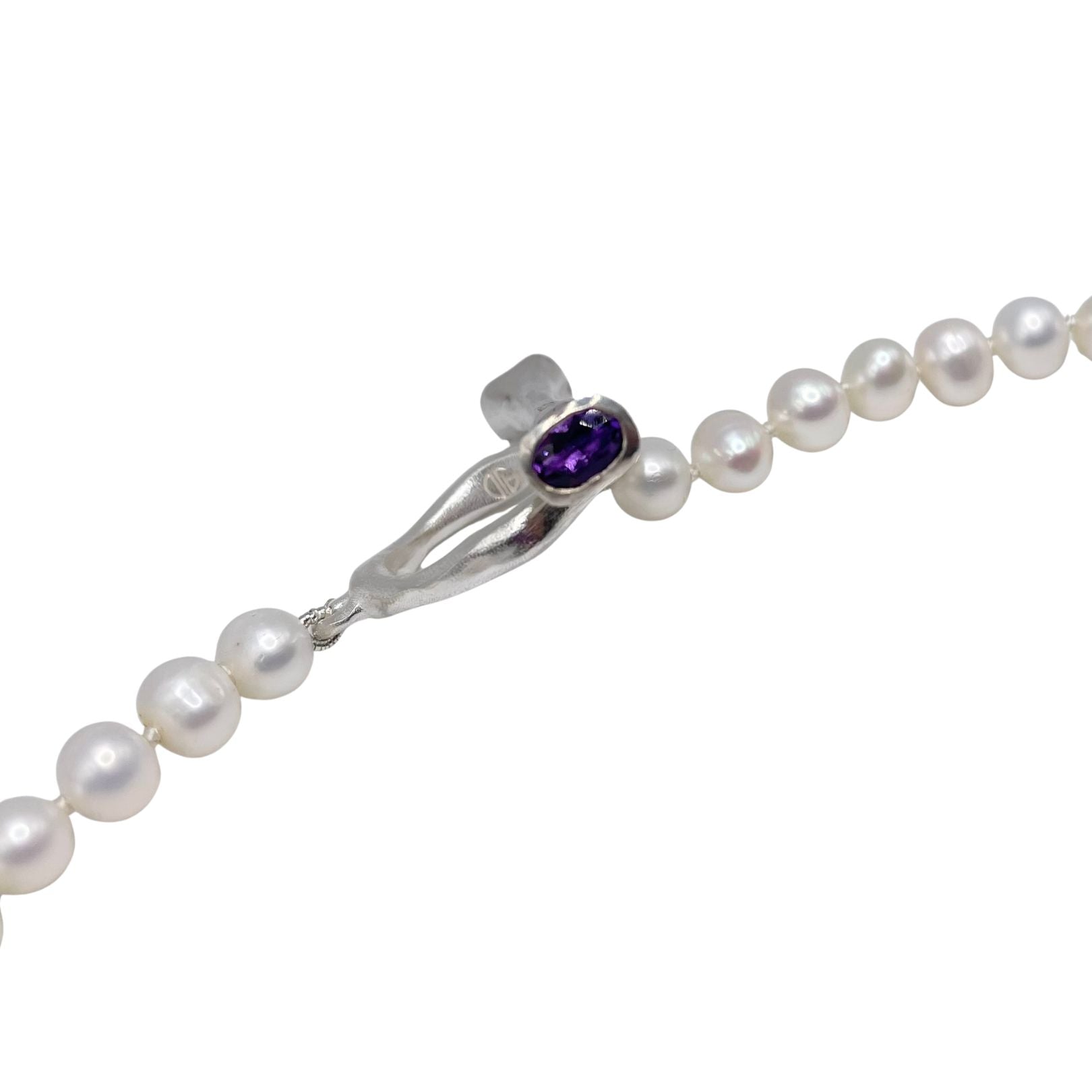 Silver clasp with amethyst on pearls by Amy Delson