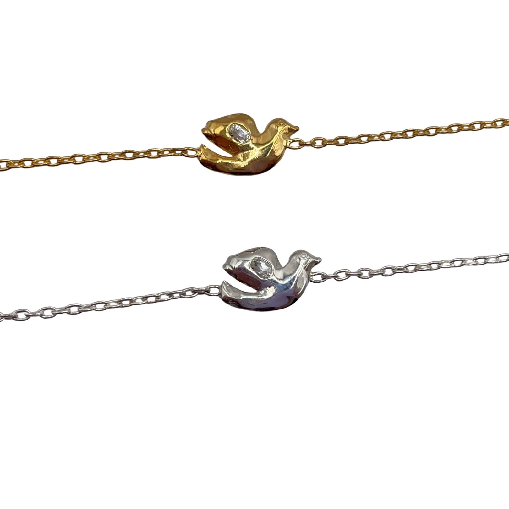 Sterling Silver and 18k gold vermeil with white topaz dove bracelets by Amy Delson 