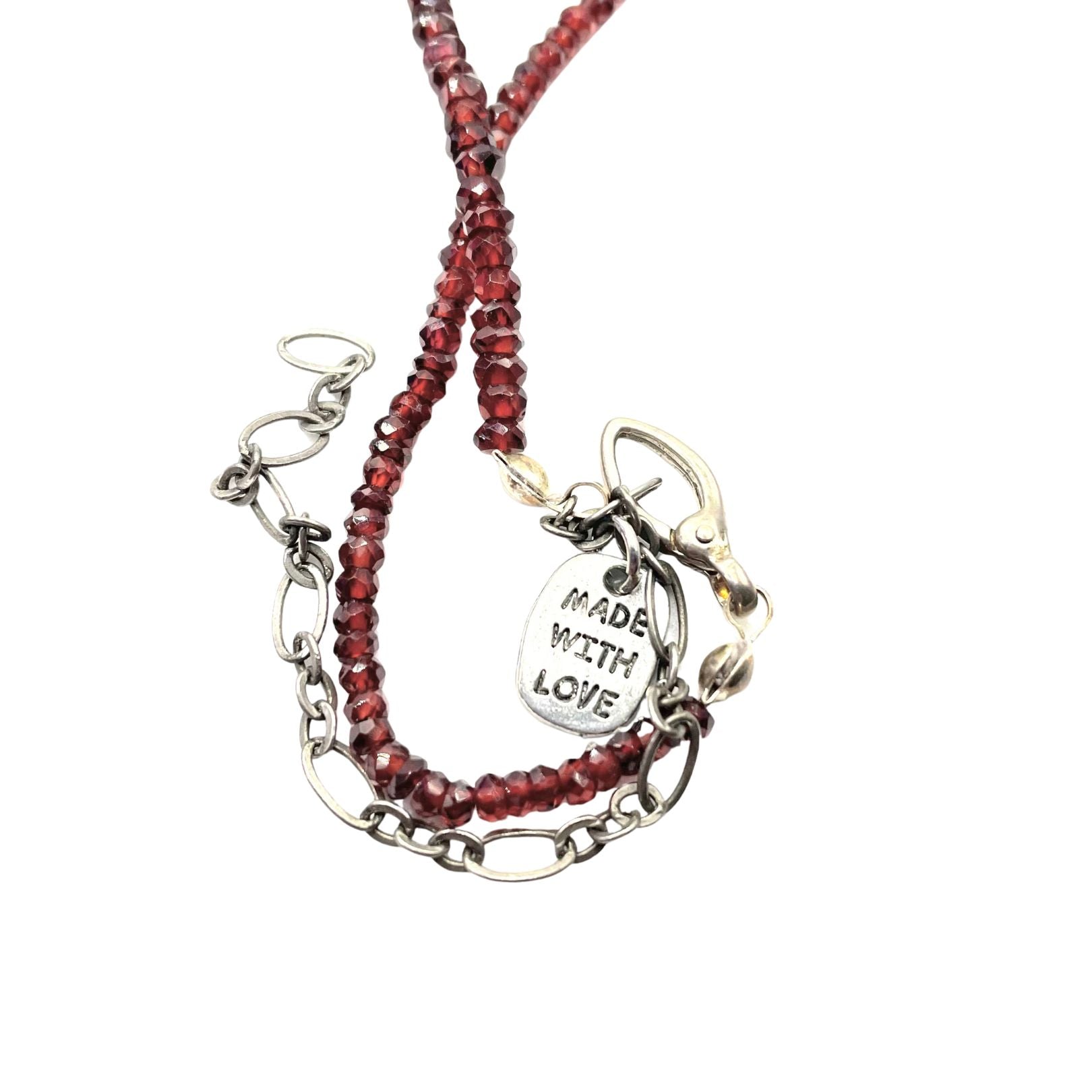 Closeup made with love tag garnet necklace Amy Delson