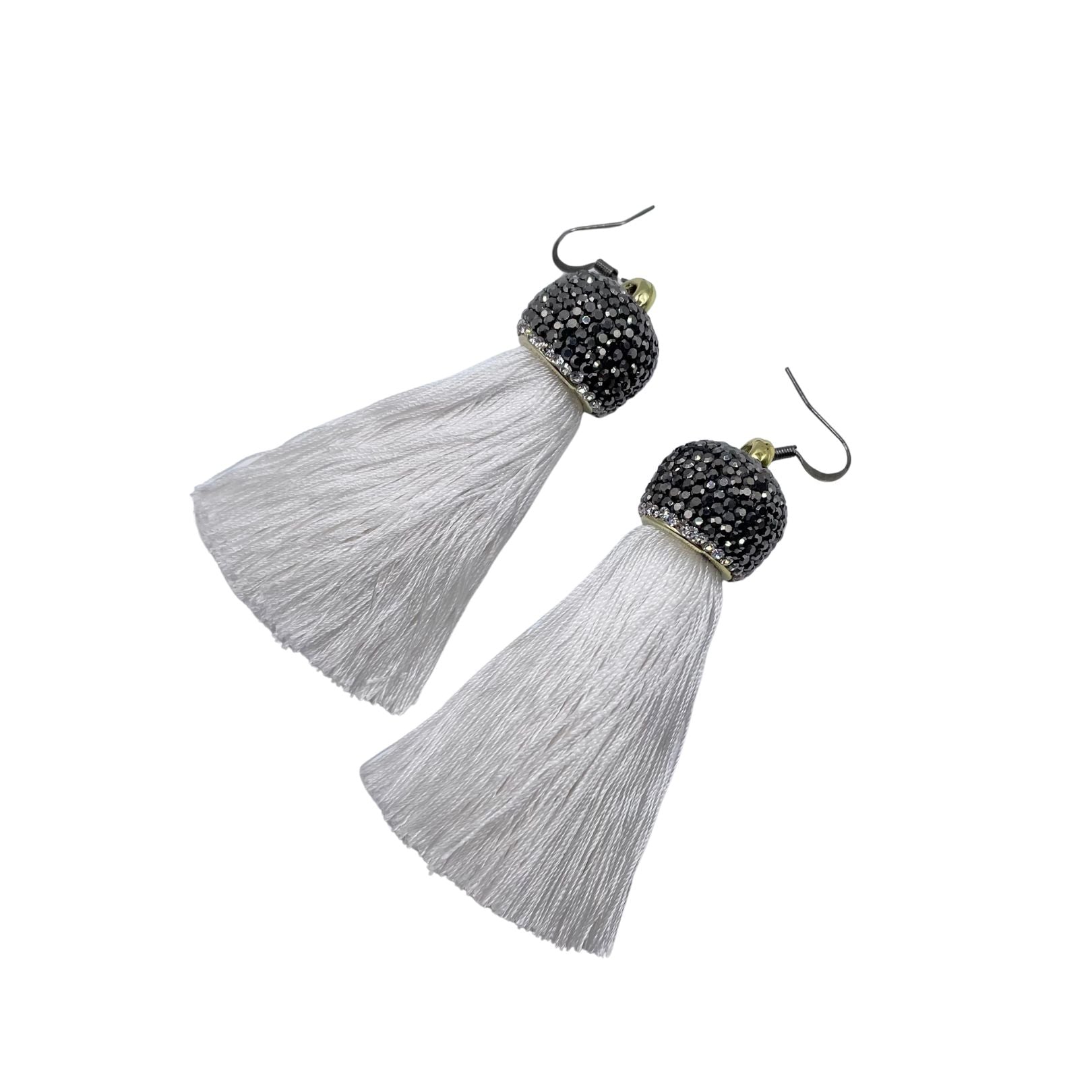 White tassel earrings by Amy Delson