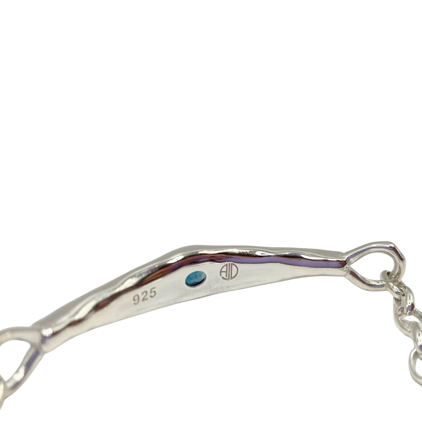 Inside Amy Delson Silver Bracelet showing her logo and 925 Sterling stamp