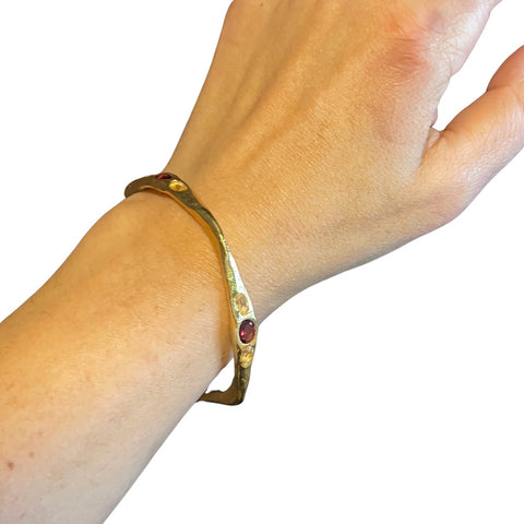 Garnet Citrine Gold Bangle on wrist