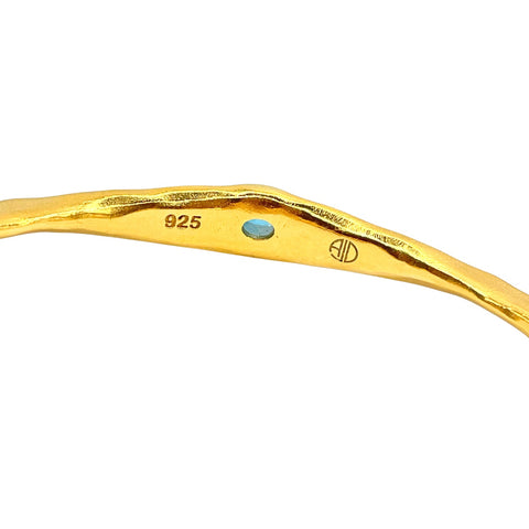 Inside gold Blue topaz bangle by Amy Delson