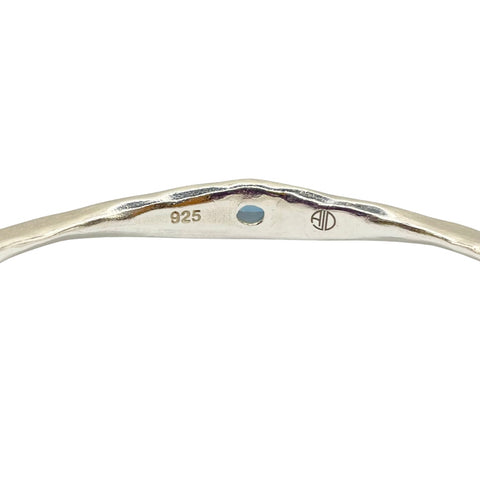 Inside Amy Delson silver blue topaz bangle