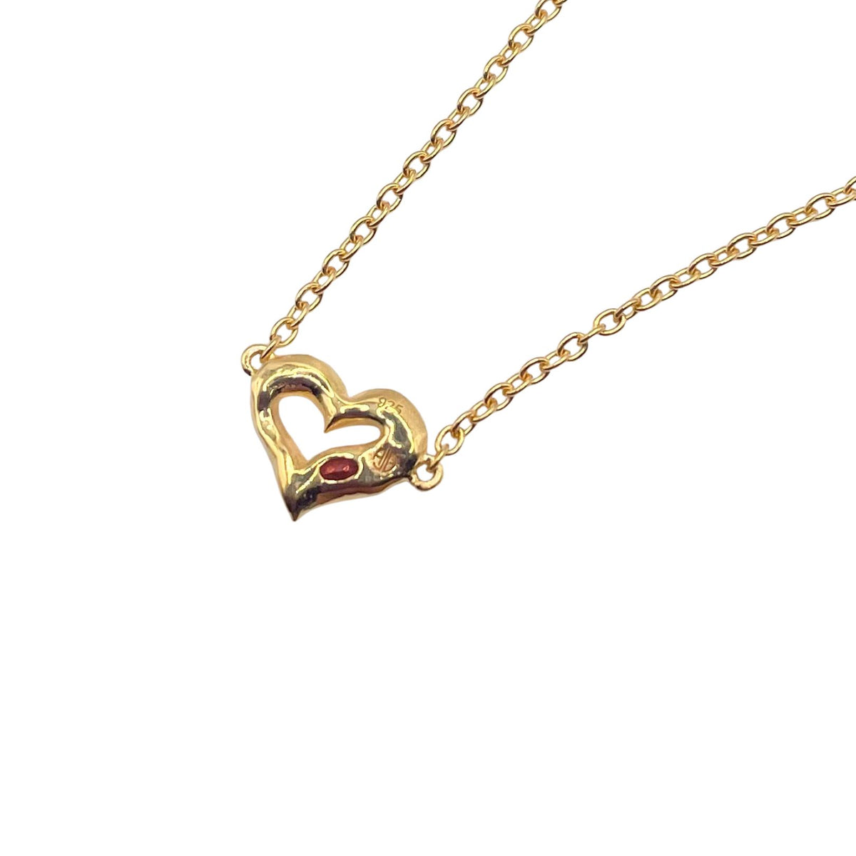 back of gold garnet heart bracelet by Amy Delson