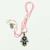Pink tourmaline purple CZ hamsa necklace by Amy Delson