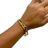 Amy Delson gold bangle stack
